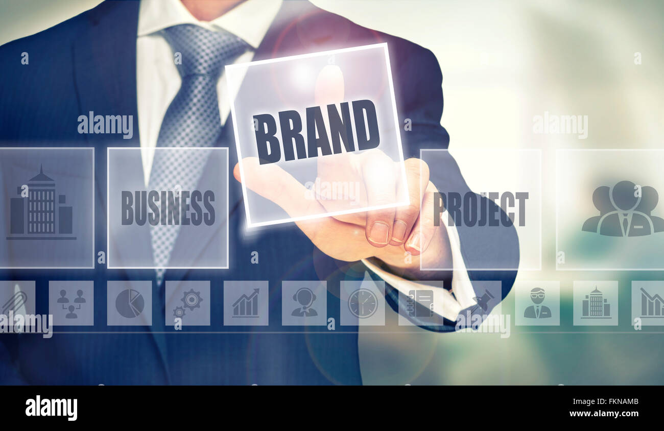 businessman-pressing-a-brand-concept-button-FKNAMB